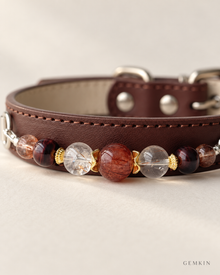 Side view of red tiger’s-eye and black-gold Super Seven beadwork